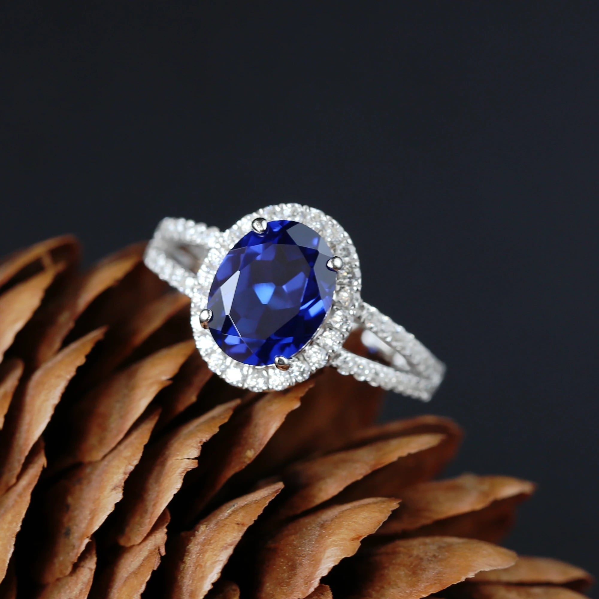 V Shaped Oval Created Sapphire Ring Slimming Sparkling Design